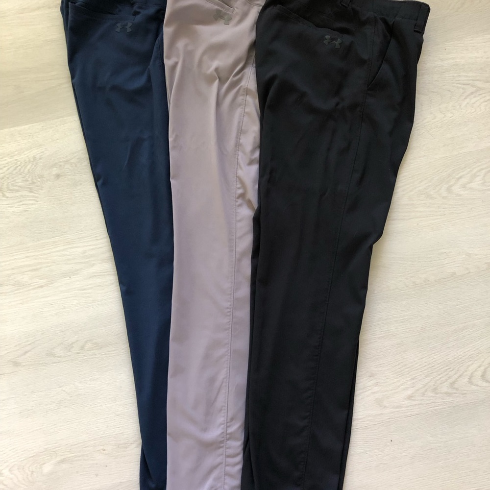4 pairs men’s Under Armour Showdown golf pants. 30 x 32. Very good condition.